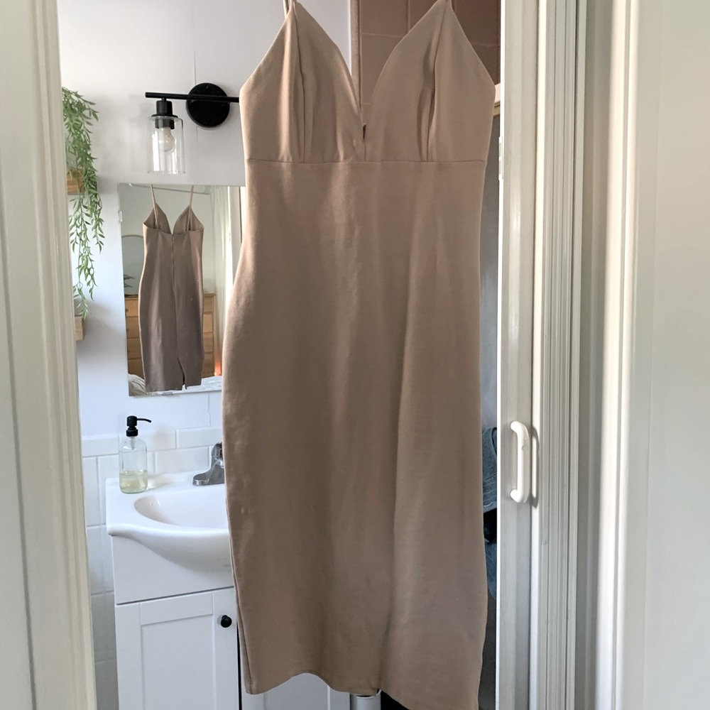Beige medium bodycon dress.
